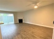 Thumbnail 14 of 18 - Peachgrove Apartments Living Room with fireplace