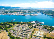 Thumbnail 5 of 27 - an aerial view of a marina with a city in the background