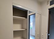 Thumbnail 5 of 22 - Punahou Circle hallway with a white pantry.