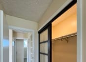 Thumbnail 9 of 18 - Punahou Heights Bedroom Closet with Light