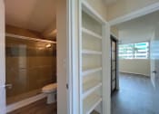 Thumbnail 5 of 18 - Punahou Heights Bedroom, Hallway Linen Closet and Bathroom