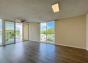 Thumbnail 4 of 18 - Punahou Heights Living Room with Picture Window Views