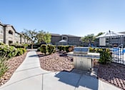 Thumbnail 11 of 19 - A sunny day at a residential area with a pool and a BBQ grill.