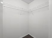 Thumbnail 33 of 48 - Empty white shelving unit in a room.
