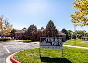Thumbnail 4 of 33 - Sterling Park Leasing Center sign in front of a building.