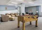 Thumbnail 5 of 15 - a room filled with lots of tables and chairs