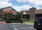 Thumbnail 7 of 24 - Trails of Walnut Creek parking lot and exterior buildings