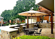 Thumbnail 6 of 20 - Bedford Oaks Apartments pool and patio