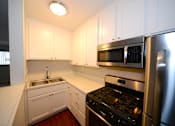 Thumbnail 1 of 18 - University Gardens kitchen with appliances