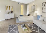 Thumbnail 20 of 39 - a bedroom with a bed couch and dresser in a 555 waverly unit