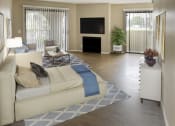 Thumbnail 19 of 39 - a living room filled with furniture and a large window