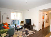 Thumbnail 13 of 27 - Yolo Apartments Living Area, Patio and Hall to Bedrooms