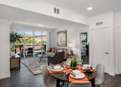 Thumbnail 8 of 28 - The Harrington Dining Area and Living Room