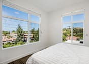 Thumbnail 12 of 28 - The Harrington bedroom with two windows