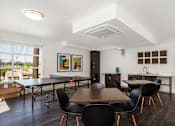 Thumbnail 16 of 28 - The Harrington interior room with ping pong and dining tables