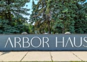 Thumbnail 12 of 26 - a brick wall with the words arbor haus written on it
