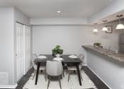 Thumbnail 6 of 35 - a dining room with a table and chairs