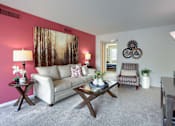 Thumbnail 20 of 39 - a living room with a couch chair and coffee table