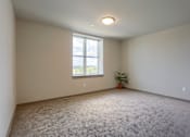 Thumbnail 12 of 20 - Mount Joy Senior Housing | Bedroom with a window