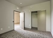 Thumbnail 8 of 20 - Mount Joy Senior Housing | a bedroom with a carpeted floor