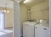 Thumbnail 46 of 51 - Mechanicsburg Apartments | Rockledge Townhomes |  a washer and dryer in a laundry room