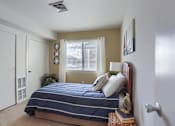Thumbnail 27 of 39 - Harrisburg Apartment | Twin Lakes Apartments | a bedroom with a bed and a window