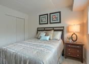 Thumbnail 10 of 13 - Harrisburg Apartment | Twin Lakes Apartments | a bedroom with a bed in a room