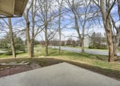 Thumbnail 37 of 51 - Mechanicsburg Apartments | Rockledge Townhomes |a view of the back patio