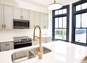 Thumbnail 10 of 26 - High-End Apartment Kitchen