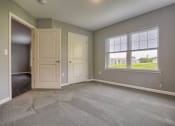 Thumbnail 26 of 29 - Large window bedroom| Apartments in Mechanicsburg PA | Oakwood Hills Apartments