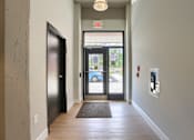 Thumbnail 3 of 20 - Mount Joy Senior Housing | a hallway with a door