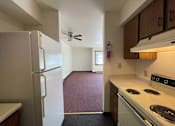Thumbnail 13 of 14 - this is a photo of the kitchen in a 750 square foot 1 bedroom apartment at park lane