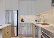 Thumbnail 1 of 67 - A modern kitchen with a stainless steel refrigerator and wooden cabinets.