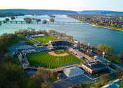 Thumbnail 8 of 18 - an aerial view of a baseball stadium next to a river