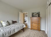 Thumbnail 11 of 16 - Mechanicsburg Apartments | Delbrook Manor Apartments | a bedroom with a bed and a dresser