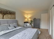Thumbnail 14 of 16 - Mechanicsburg Apartments | Delbrook Manor Apartments | a bedroom with a large bed and a dresser