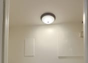 Thumbnail 16 of 16 - Mechanicsburg Apartments | Delbrook Manor Apartments | a small laundry room with a washer and dryer