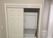 Thumbnail 3 of 13 - A white door with a small fridge in it.