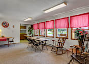 Thumbnail 6 of 15 - a room with a table and chairs