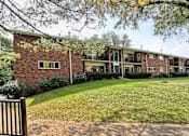 Thumbnail 5 of 8 - our apartments offer a spacious courtyard with green grass