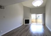 Thumbnail 5 of 37 - The Camelia Flooring Vaulted Ceiling Living Room