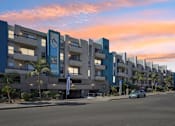 Thumbnail 18 of 53 - A modern apartment complex named "FELIX" is shown in the image.