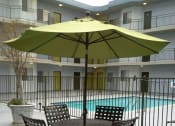Thumbnail 18 of 45 - Lounge chairs and pool area at vassar terrace