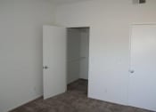 Thumbnail 17 of 18 - Walk in closet with storage space