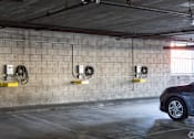 Thumbnail 38 of 54 - a car parked in a parking garage