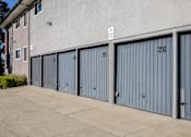 Thumbnail 34 of 37 - A parking sign is on the wall above the garage doors.