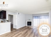 Thumbnail 1 of 37 - A kitchen with wooden floors and white walls, with a text overlay that says "Ask Us About Our Move-In Specials!".