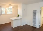 Thumbnail 21 of 31 - Arms kitchen. a kitchen with a white counter top and a window