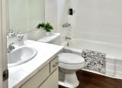 Thumbnail 13 of 31 - a small bathroom with a toilet sink and shower