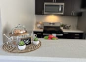 Thumbnail 43 of 45 - a kitchen counter with a tray with food on it